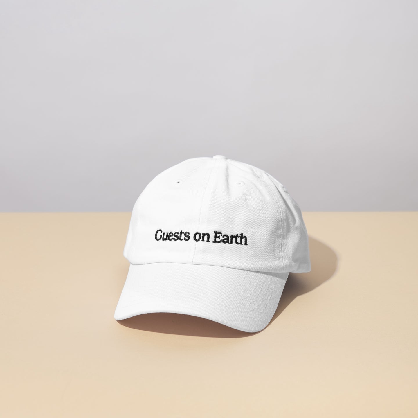 Guests on Earth Ambassador White Cap