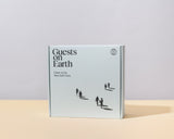 Guests on Earth Gift Box in minimalist white packaging on a neutral backdrop, ready to give